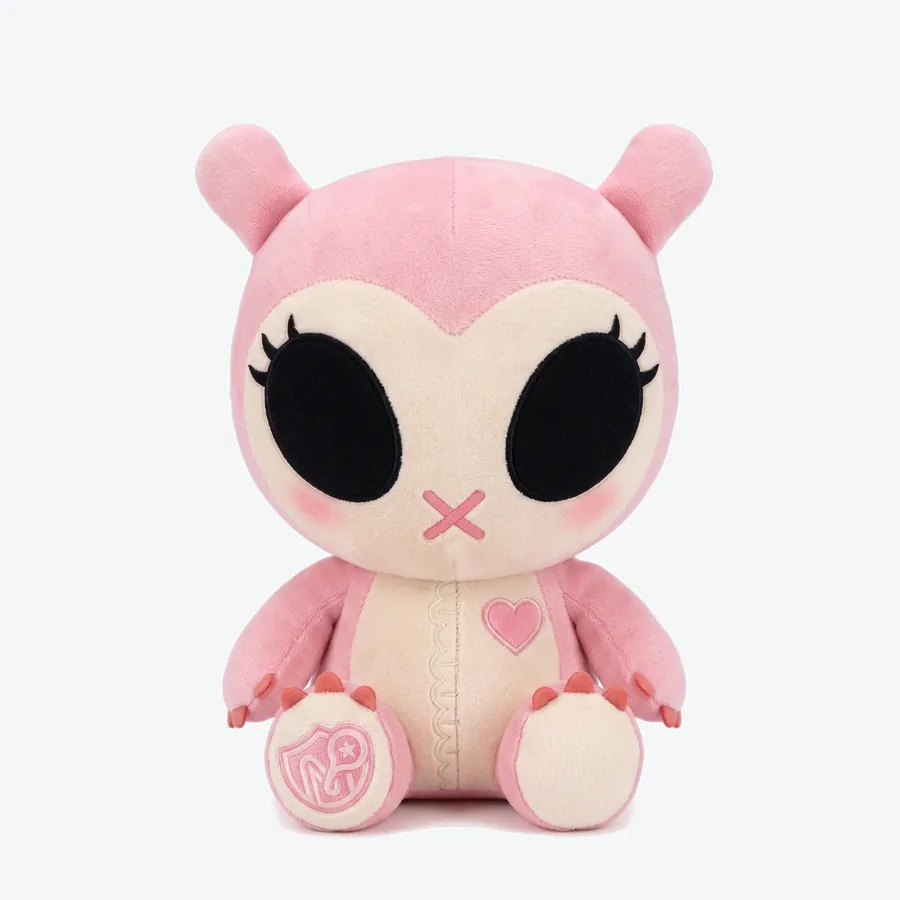 Zen, a pink plush toy with a heart on its tummy, seen from the front